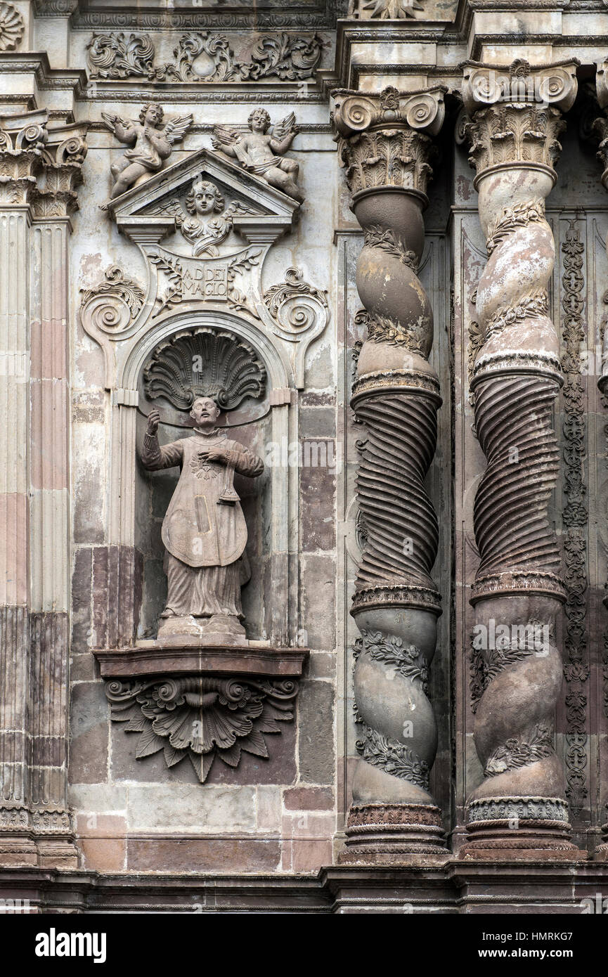 Stone carvings at the façade of the church La Compañia de Jesús made of Ecuadorian andesite stone, Quito, Ecuado Stock Photo