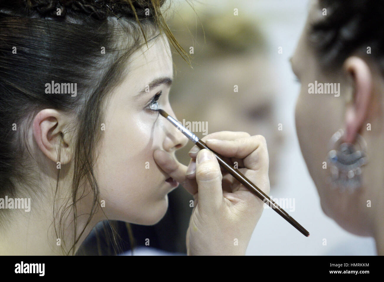 Kiev, Ukraine. 4th Feb, 2017. A model gets her makeup done backstage ...