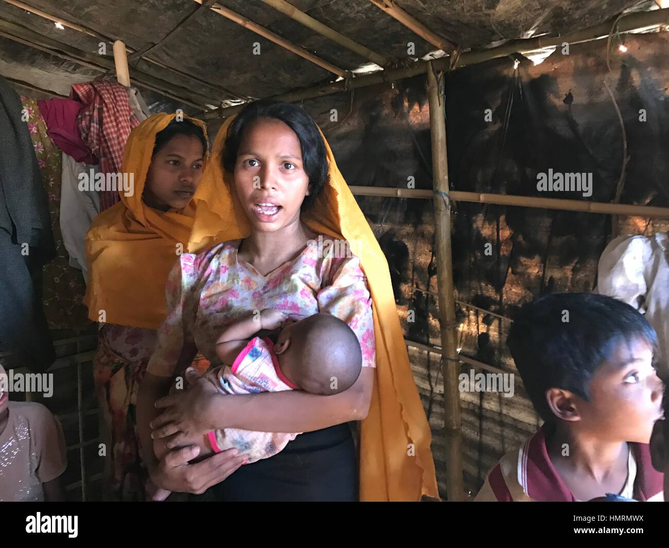 Begum Samrika, 22, who gave birth to a son the day she arrived at Kutupalong refugee camp, has found shelter after she fled violence in Myanmar in November. The woman had to walk a long way to cross into Bangladesh even she was at her final stage of pregnancy. The Photograph was taken by Nazrul Islam near Kutupalang refugee camp in Ukhiya sub-district of Cox·s Bazar on January 26, 2017. Photo: Nazrul Islam/dpa Stock Photo