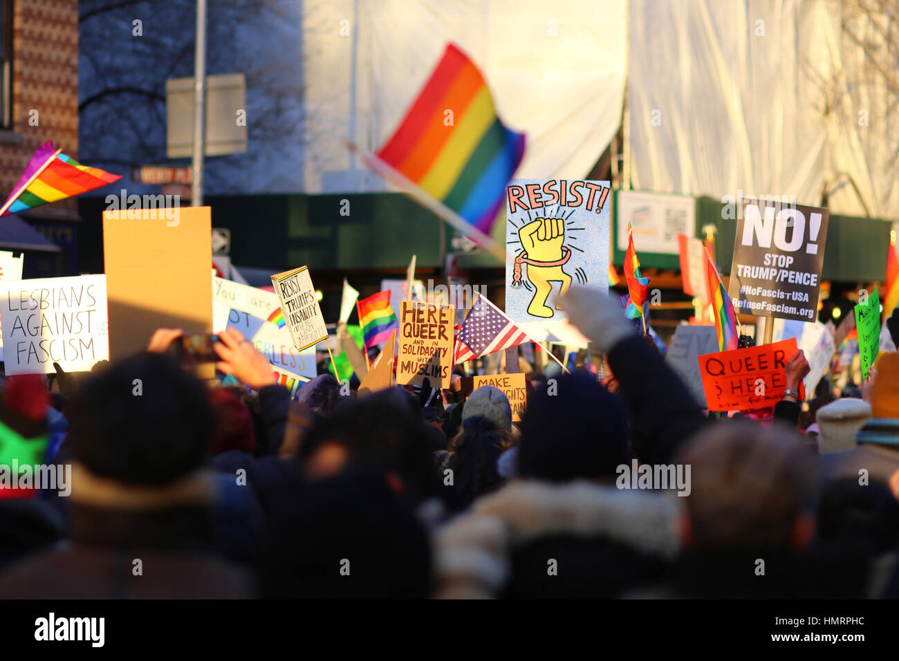 New York, USA. 4th February, 2017. Demonstrators at the LGBTQ Solidary rally in front of the Stonewall Inn against executive orders issued by President Trump banning people from seven Muslim-majority countries from entering the U.S. People want to show support for those most affected by recent policies enacted by Donald Trump. February 4, 2017 Stock Photo