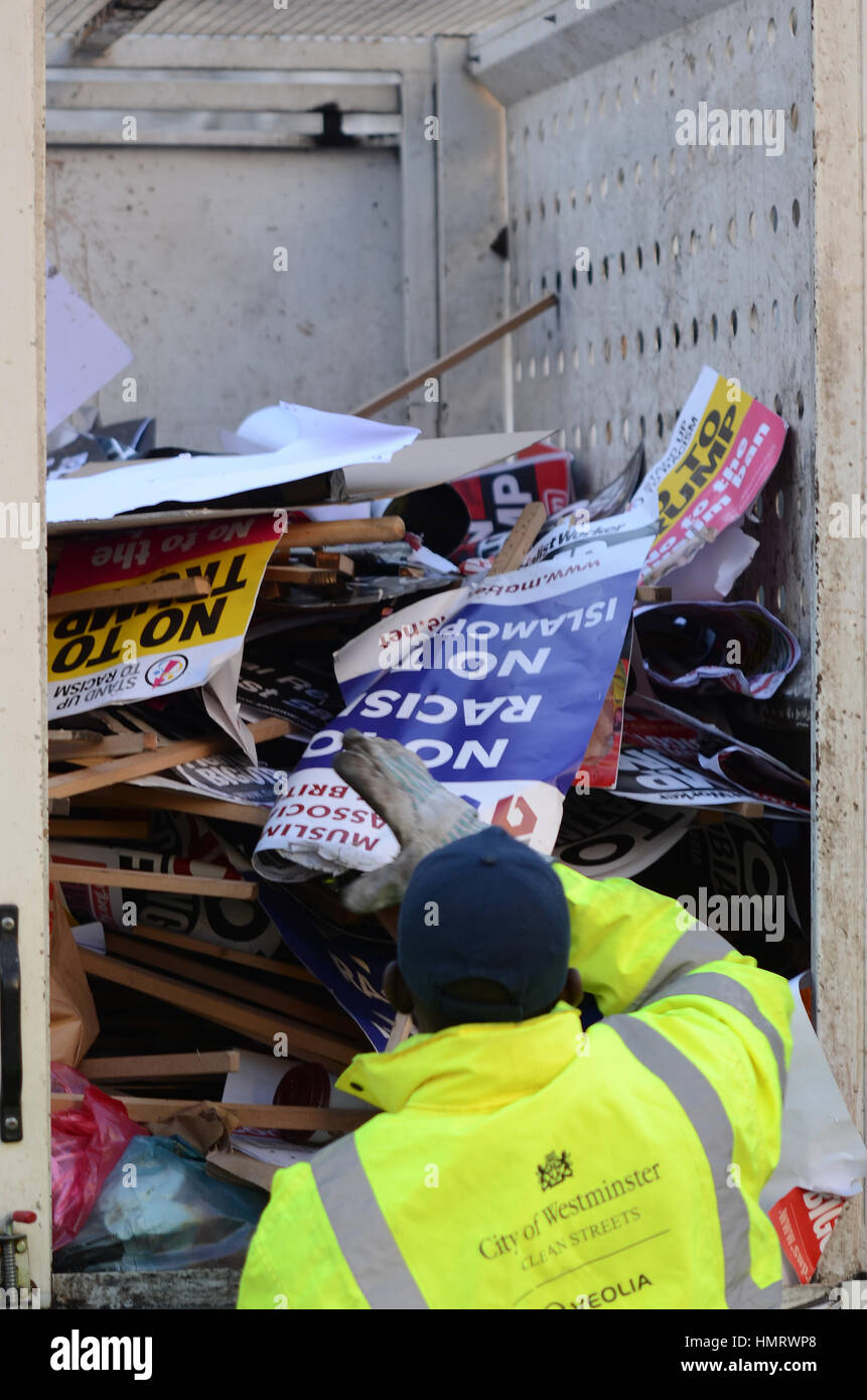 Clearing up after the protesters. Protesters gathered outside the US Embassy in London and marched on Downing Street to protest against Donald Trump's executive order - dubbed his 'Muslim Ban'. Stock Photo