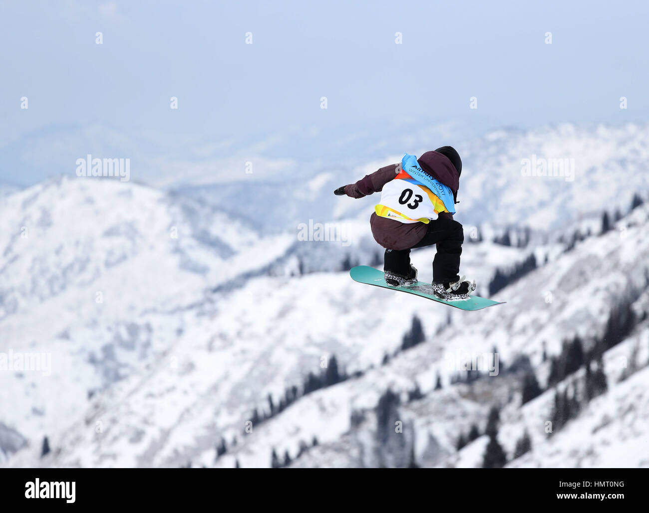 Almaty, Kazakhstan. 5th Feb, 2017. Zhai Yue of China competes during Ladies' Slopestyle Finals of Snowboard at the 28th Winter Universiade in Almaty, Kazakhstan, Feb. 5, 2017. Zhai Yue took the 4th place with 64.75 points. Credit: Meng Yongmin/Xinhua/Alamy Live News Stock Photo