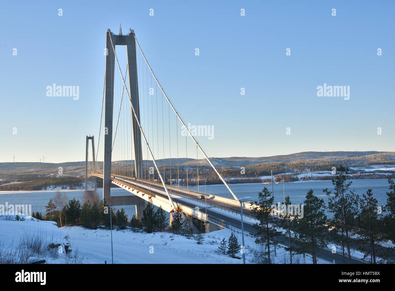 High coast bridge in midwinter sun, picture from the North of Sweden. Stock Photo