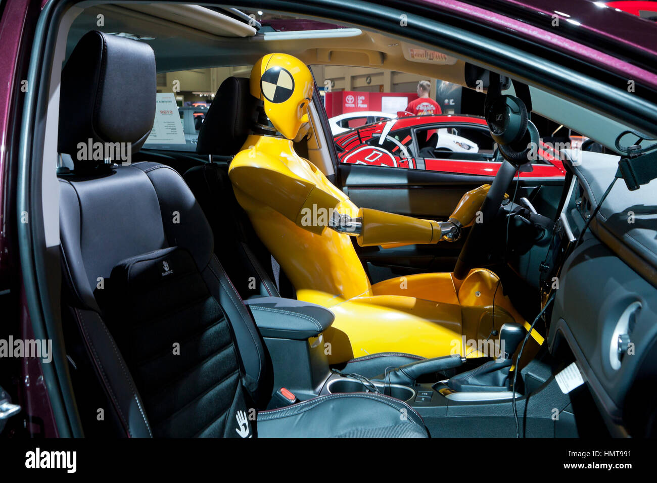 Crash test dummy model sitting in car at 2017 Washington Auto Show
