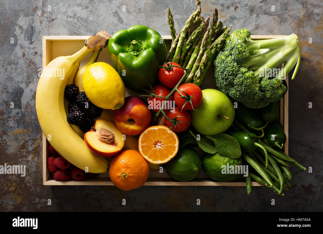 Fresh and colorful vegetables and fruits in a wooden crate Stock Photo ...