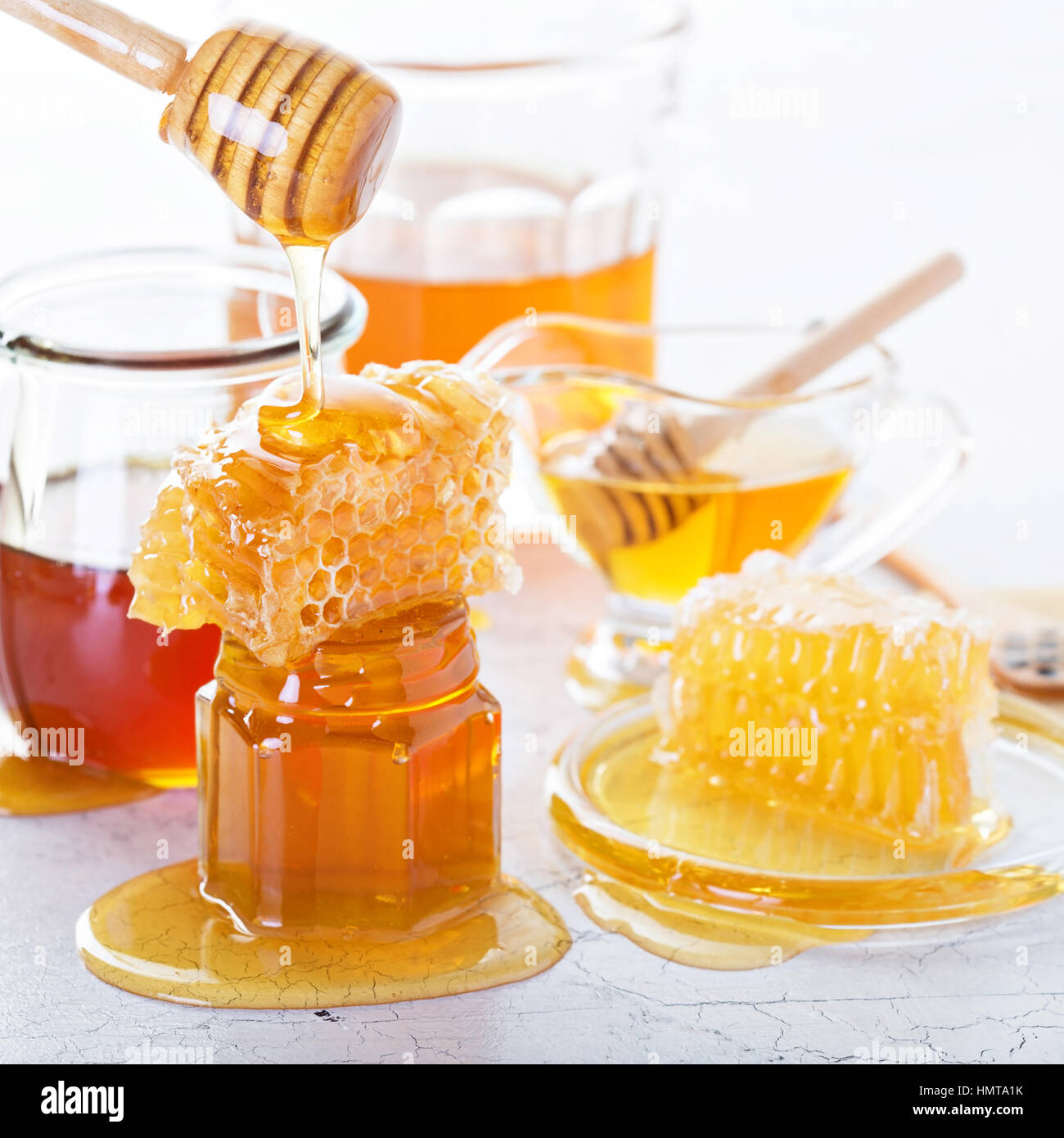 Various types of honey in glass jars and Stock Photo Alamy