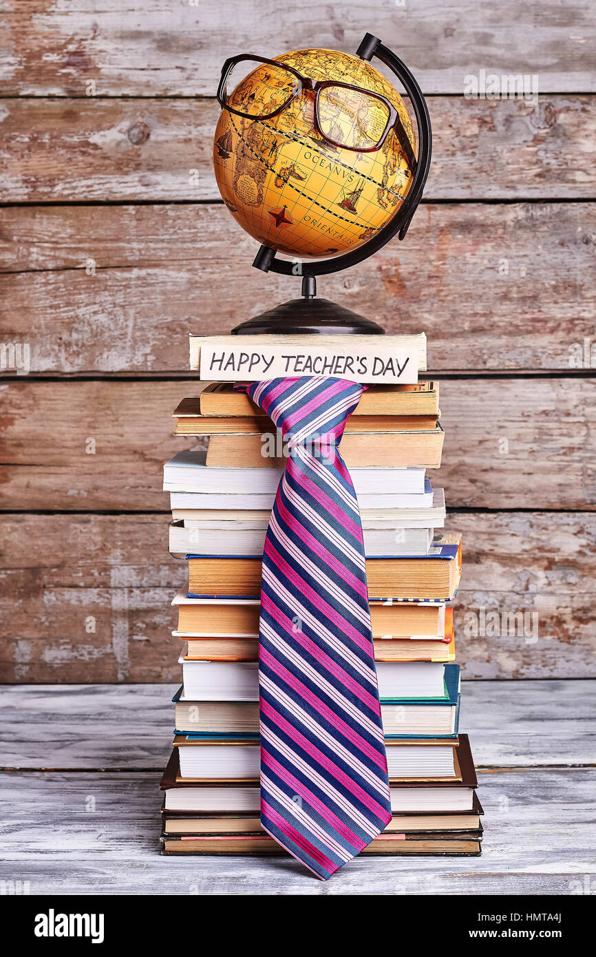 Glasses on globe and tie. Stock Photo