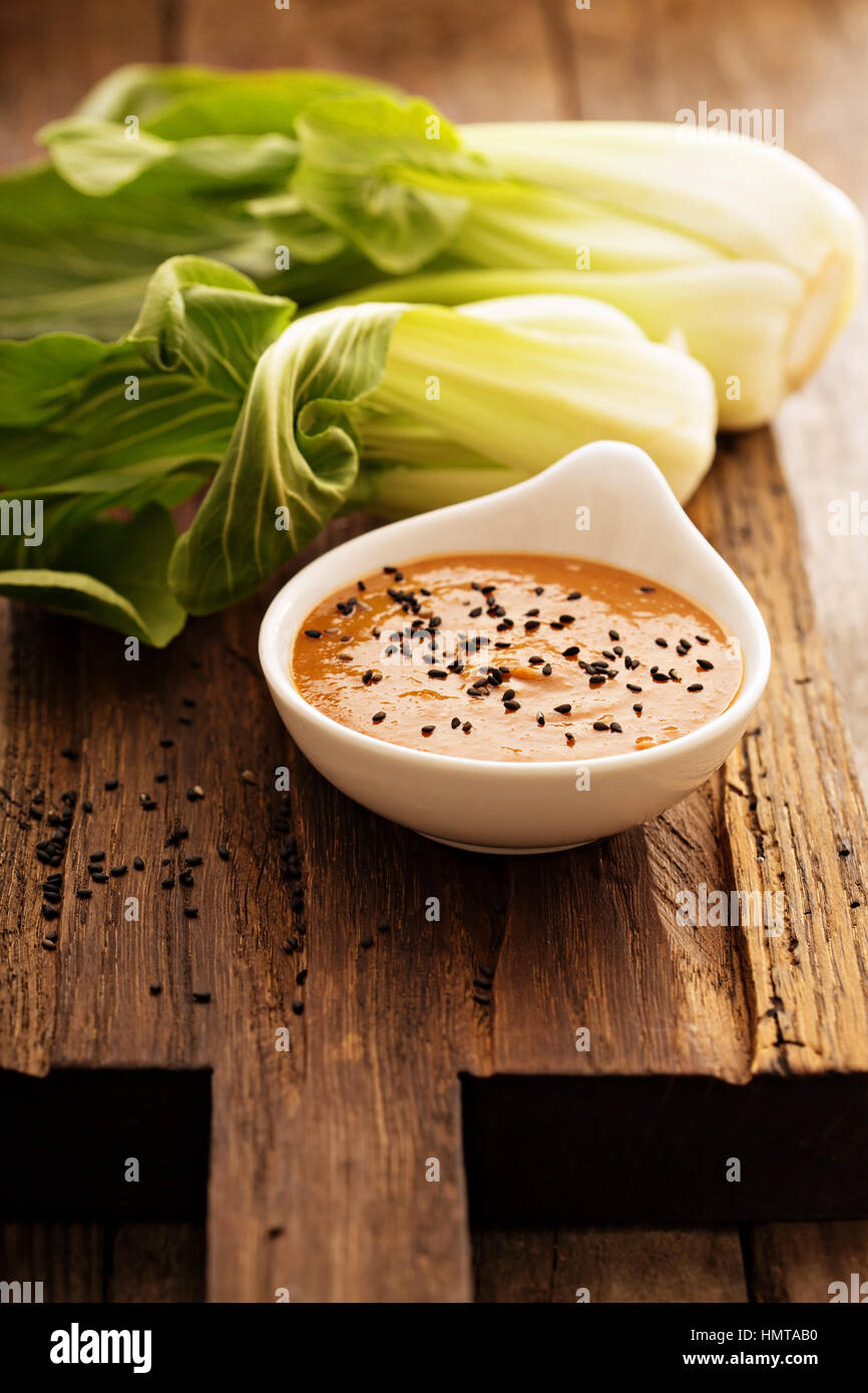 Homemade asian peanut dressing with black sesame seeds Stock Photo Alamy