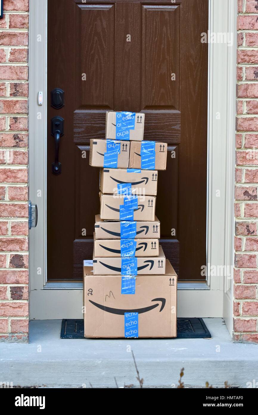 Amazon Prime packages delivered to a residential home Stock Photo