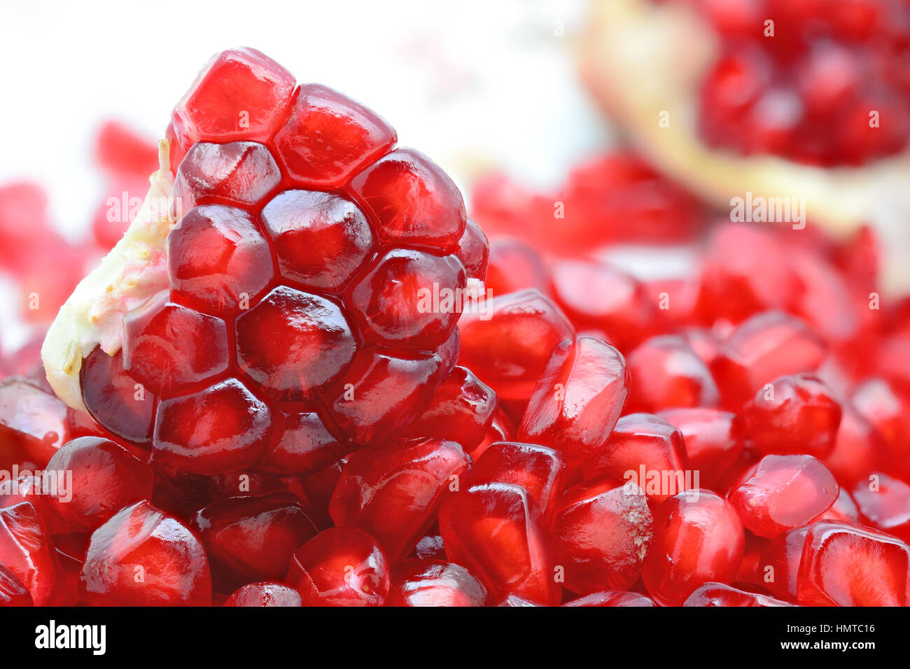 Red juicy pomegranates seeds hi-res stock photography and images - Alamy
