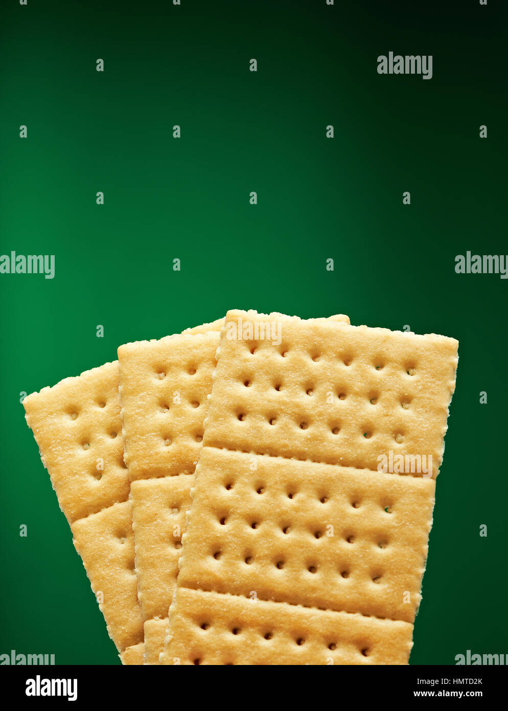three rectangle cookies isolated on green background Stock Photo