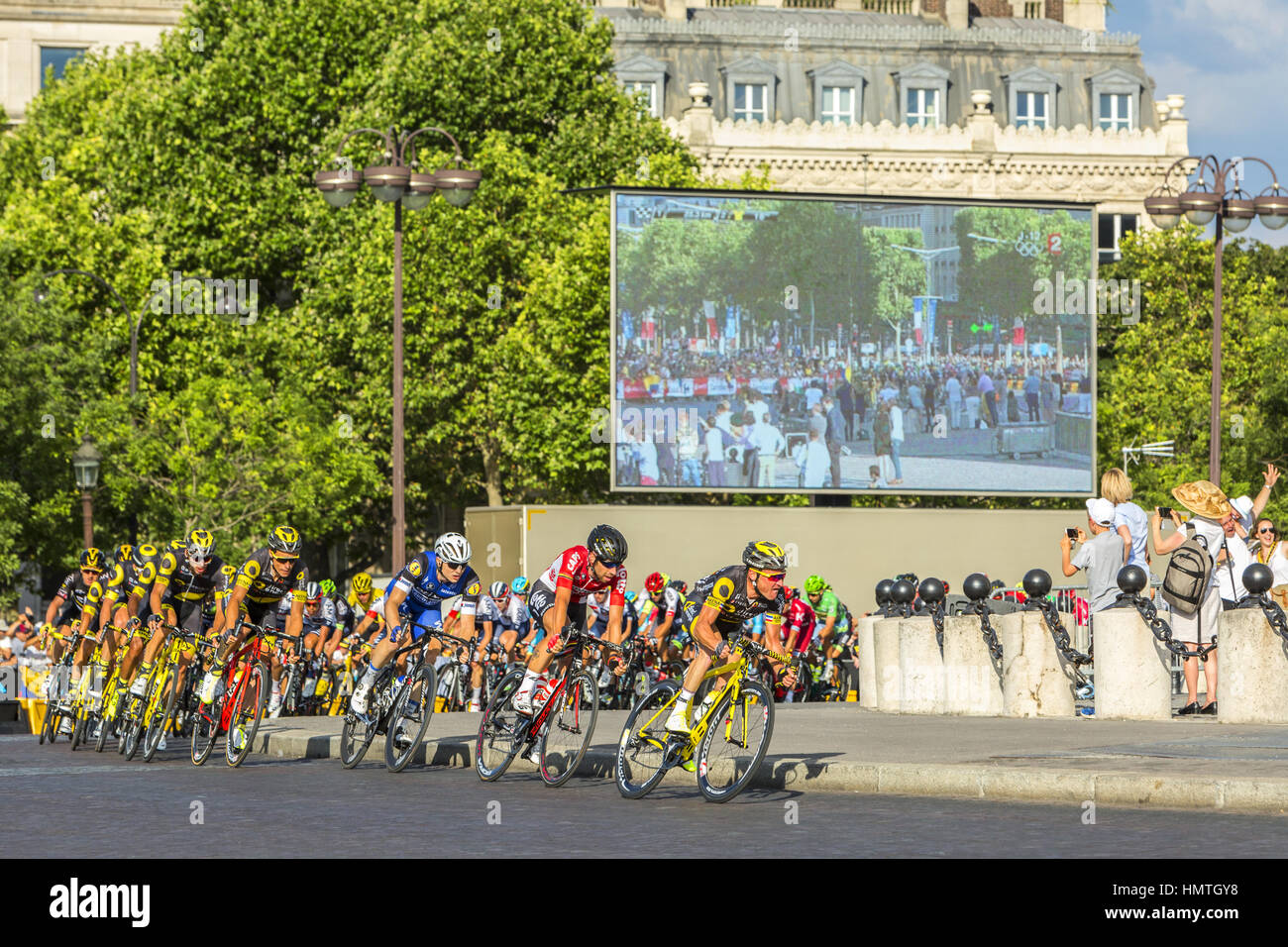 Paris, France - July 24, 2016: Thomas Voeckler of Direct Energie Team and Thomas De Gendt of Lotto-Soudal Team in fornt of the peloton passing by the  Stock Photo