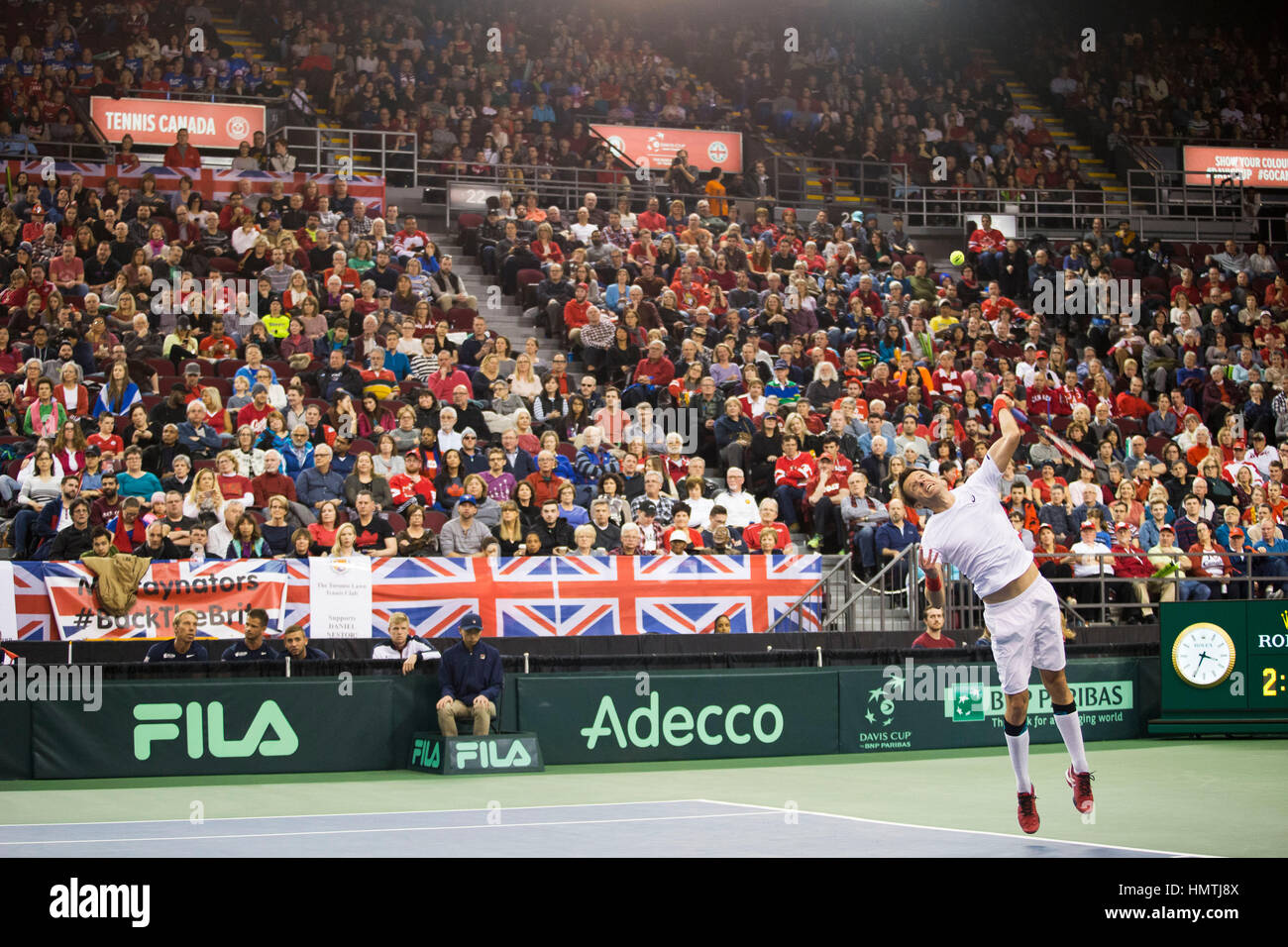 February 4th 2017, Ottowa, Canada;  Daniel Nestor of Canada serves against  Dominic Inglot and Jamie Murray of Great Britain in men's doubles play  during the Davis Cup first round match between Canada and Great Britain at TD Place Arena in Ottawa, Canada Stock Photo