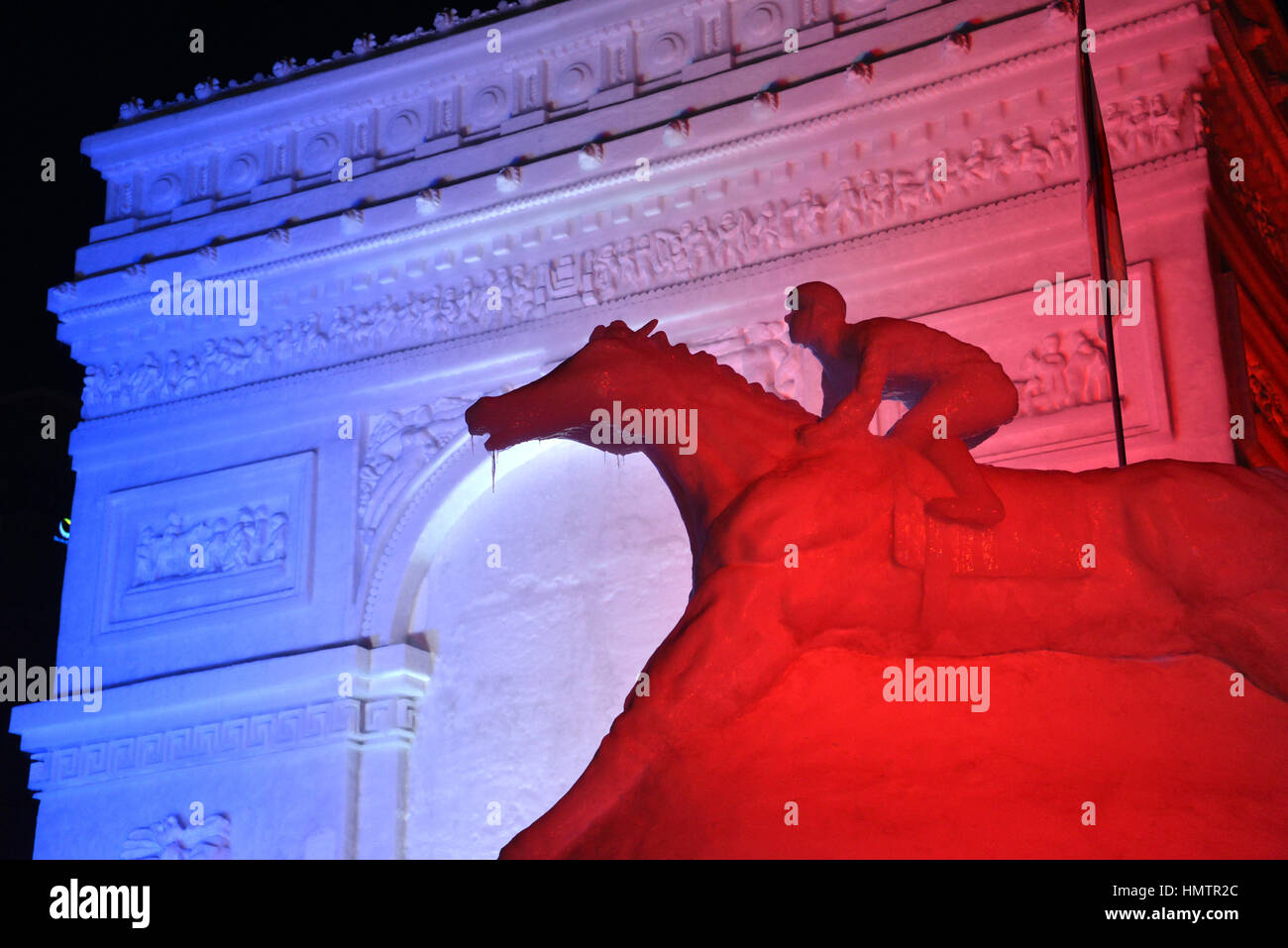 Sapporo, Japan. 5th Feb, 2017. Large snow sculptures faeturing Arc de Triomphe and a horse are illuminated at the annual Sapporo Snow Festival in Sapporo in Japan's northern island of Hokkaido. The week-long snow festival will run from February 6th through 12th and over 2.5 million people are expecting to visit. Credit: Yoshio Tsunoda/AFLO/Alamy Live News Stock Photo