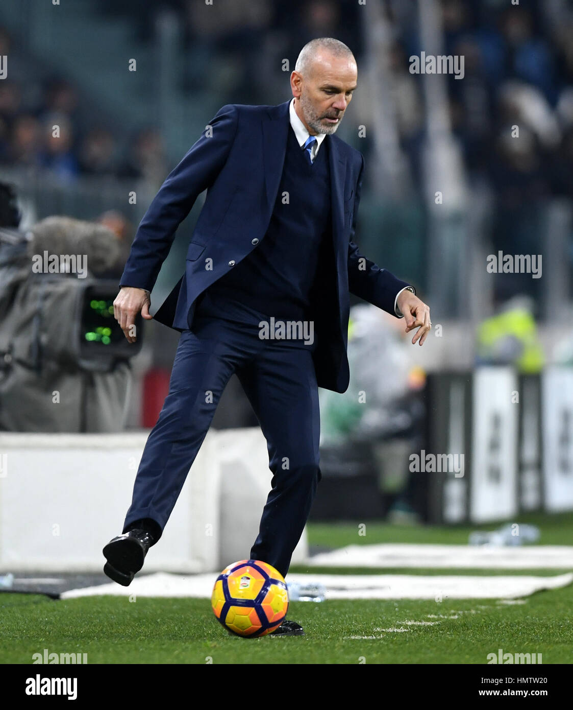 Turin, Italy. 5th Feb, 2017. Inter Milan's coach Stefano Pioli kicks the ball during the Serie A soccer match against Juventus in Turin, Italy. Juventus won 1-0. Credit: Alberto Lingria/Xinhua/Alamy Live News Stock Photo