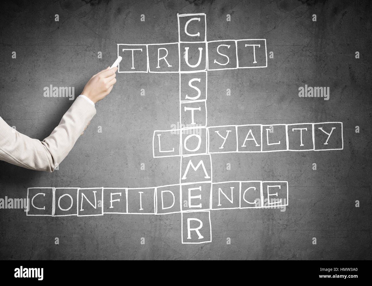 Woman draw crossword Stock Photo Alamy