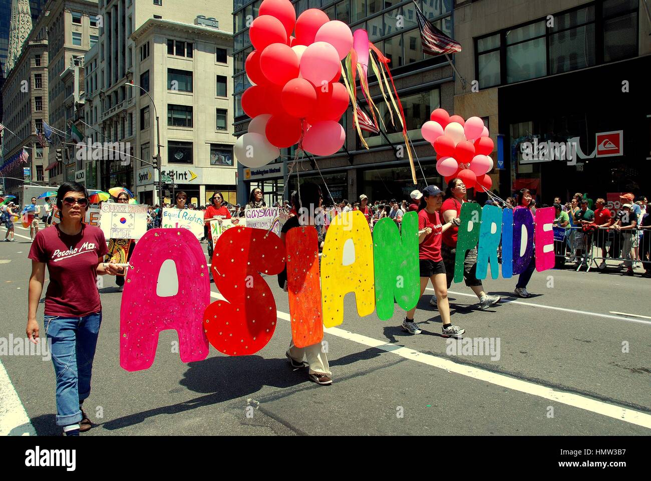 New York City - June 27, 2009:  Asian Pride members marching at the 40th anniversary gay pride parade on 5th Avenue Stock Photo