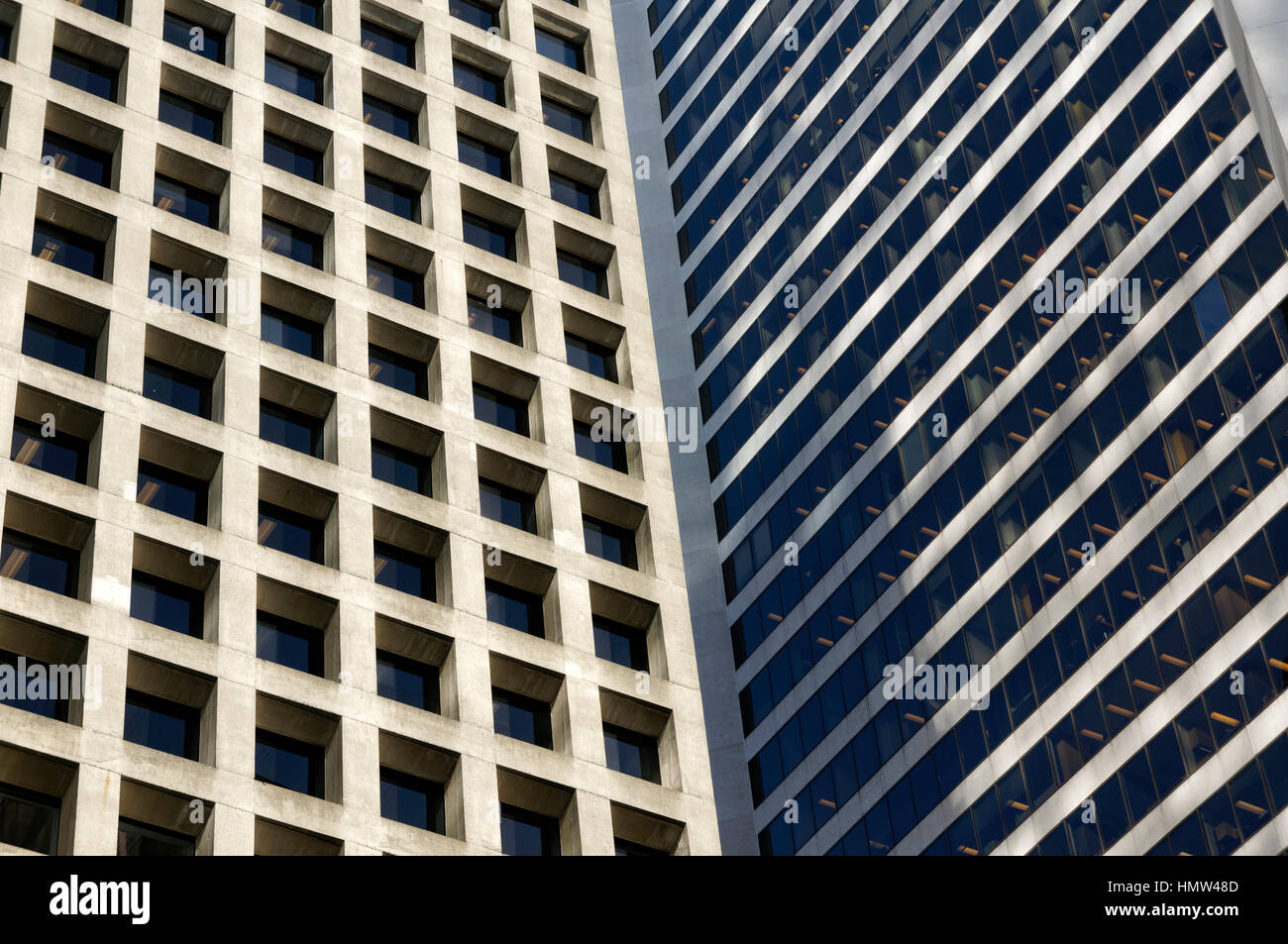 Contrasting concrete and glass facades of office towers in downtown Vancouver,  British Columbia, Canada Stock Photo