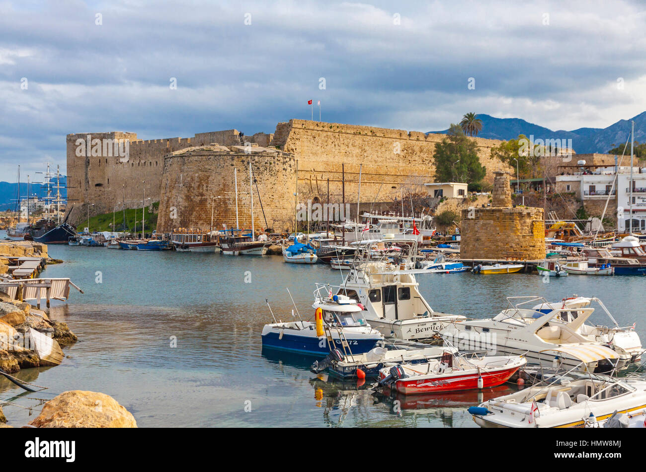 KYRENIA, CYPRUS - JANUARY 19, 2015: Old harbour and Kyrenia castle (Girne Kalesi), Northern Cyprus. Kyrenia is a city on the northern coast of Cyprus, Stock Photo