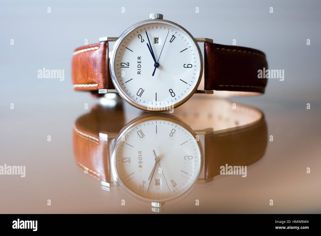 leather watch white face