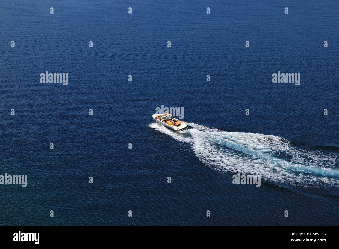Speed boat aerial view on blue open sea water Stock Photo - Alamy
