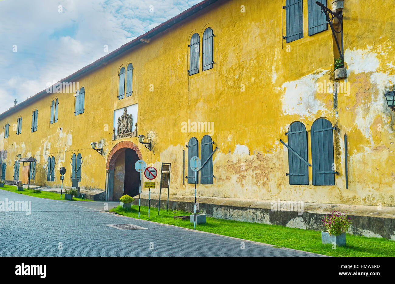 The inner part of the Old Gate, decorated with the Coat of Arms of the Dutch East India Company and surrounded by warehouses building, Galle, Sri Lank Stock Photo