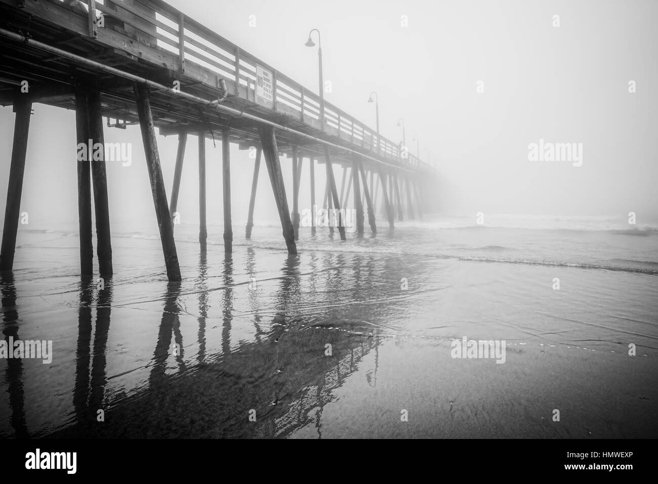 The Imperial Beach pier disappears in to the Pacific Ocean fog Stock
