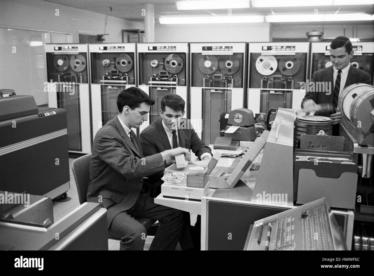 Douglas Ginsburg (far left) and Jeff Tarr (center), of Operation Match, the first computer dating service. Stock Photo
