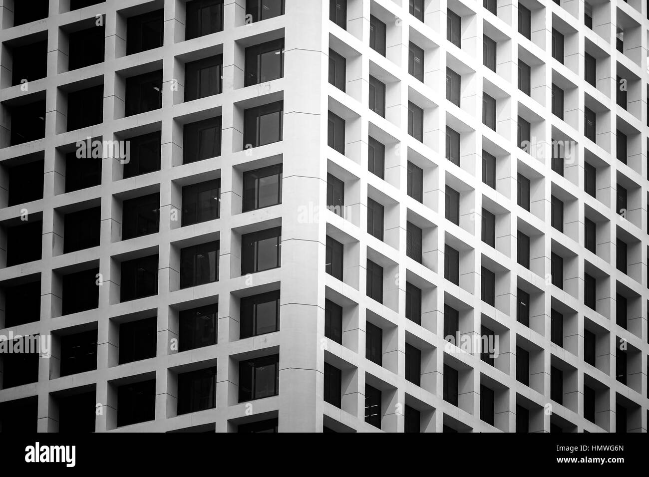 Windows of commercial building in Hong Kong with B&W color Stock Photo ...