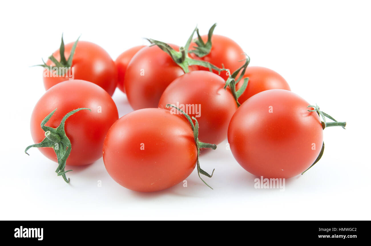 organic red tomatoes on white background Stock Photo - Alamy