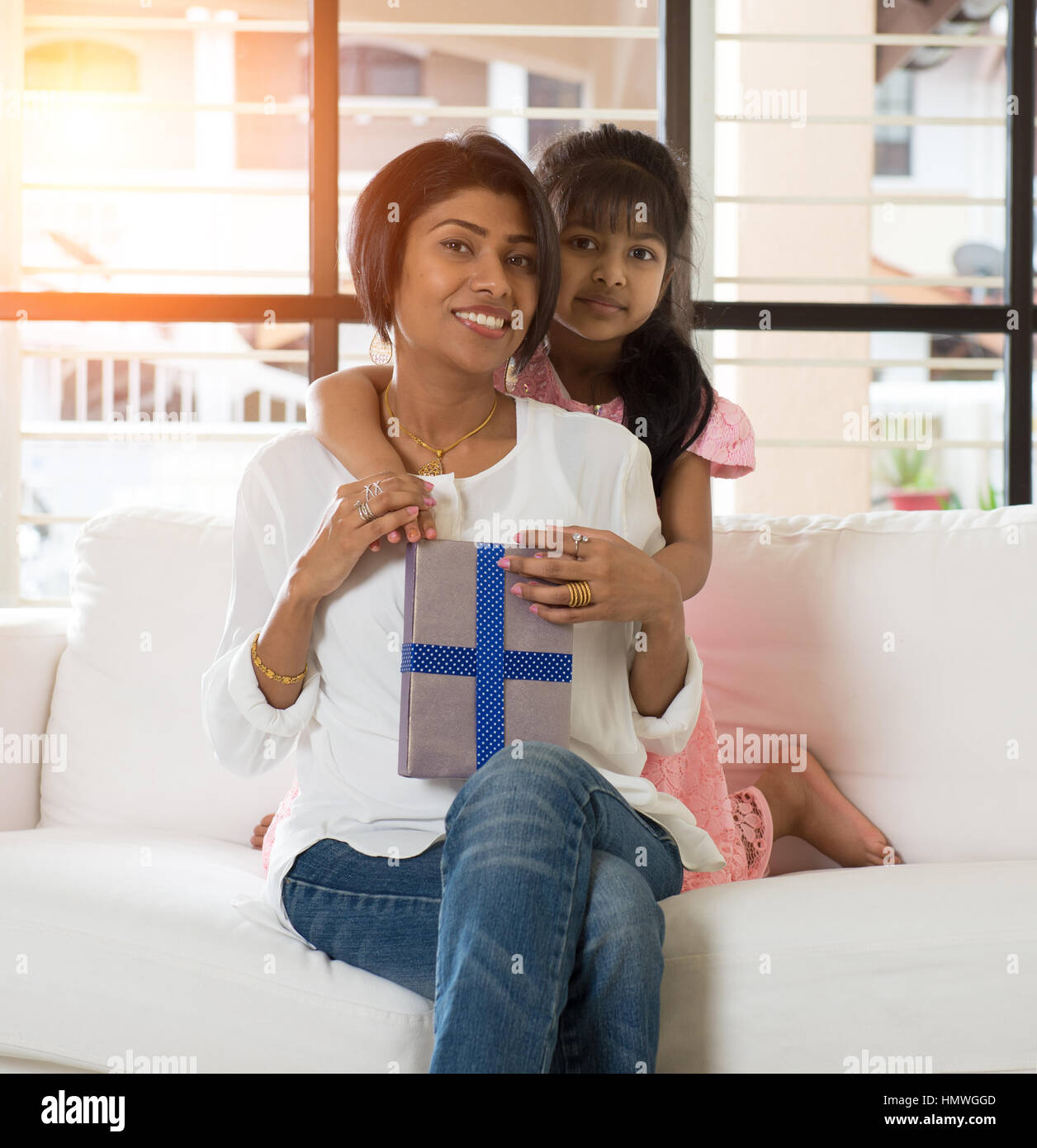 indian-mother-and-daughter-giving-present-stock-photo-alamy