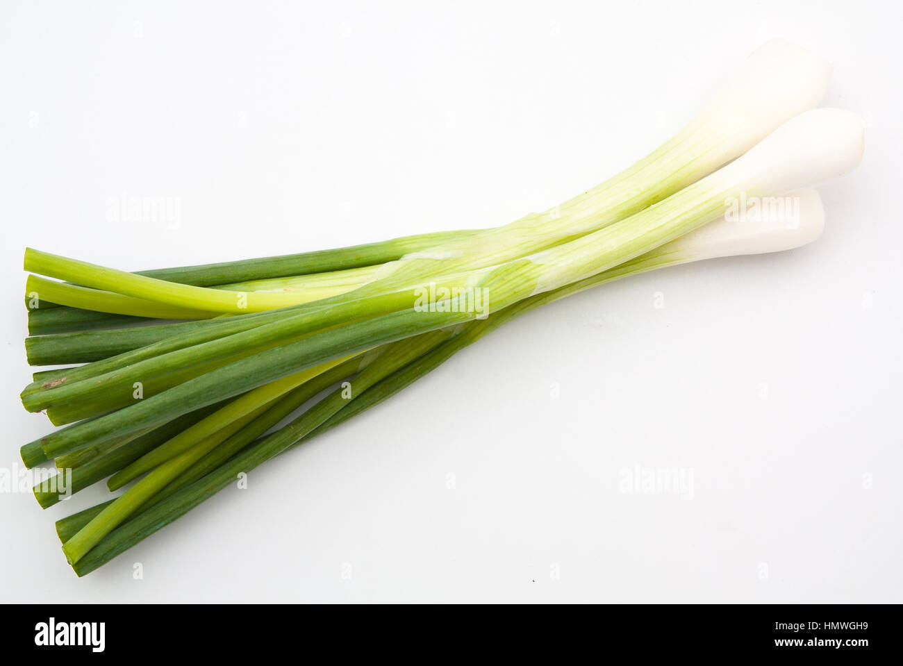 green onion isolated on the white background Stock Photo - Alamy