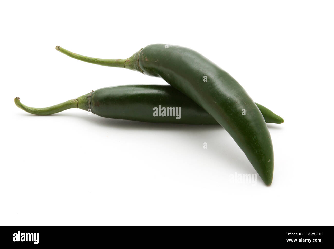 green hot chili peppers isolated on white background closeup Stock ...