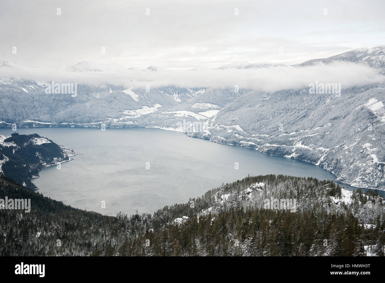 Howe Sound after a snow storm, as seen from the Sea to Sky Gondola.  Squamish BC, Canada. Stock Photo