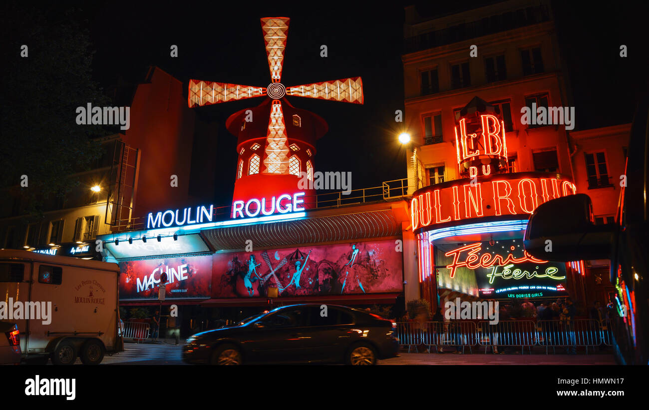 The Moulin Rouge windmill, Moulin Rouge is a famous cabaret built in 1889, located in the Paris red-light district of Pigalle Stock Photo