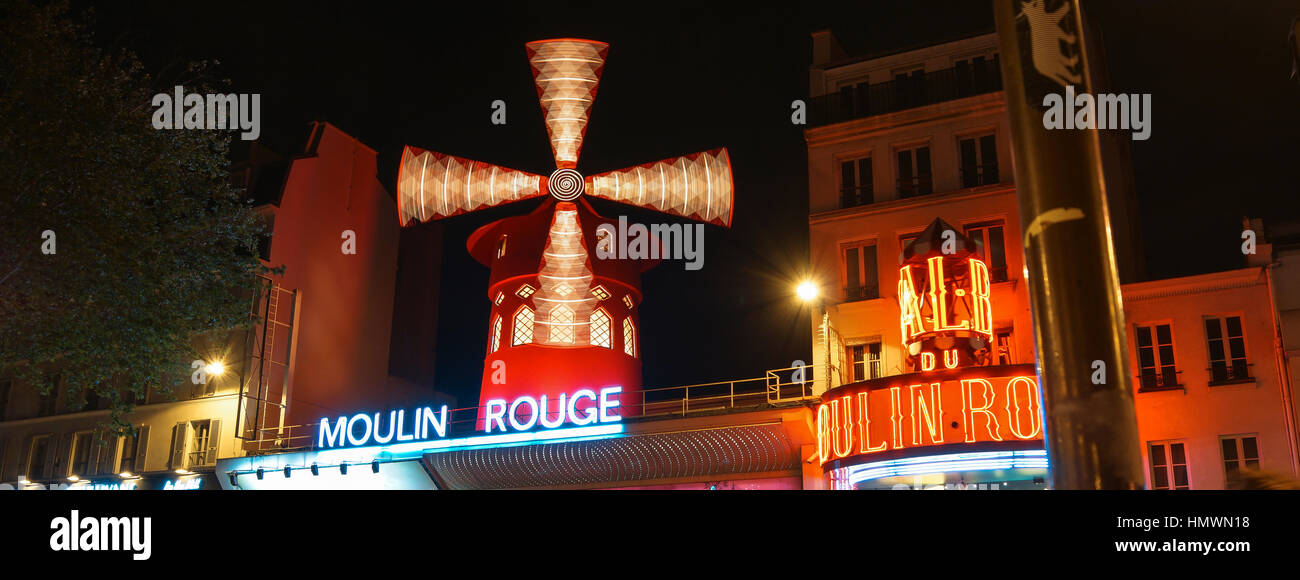 The Moulin Rouge windmill, Moulin Rouge is a famous cabaret built in 1889, located in the Paris red-light district of Pigalle Stock Photo