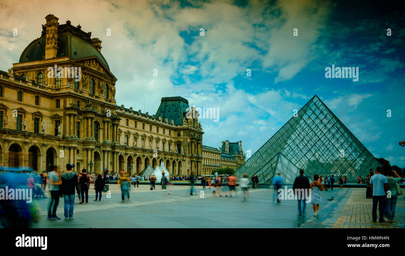 Louvre and the Pyramid.The Louvre is the most visited art museum in the world and a historic monument. Stock Photo
