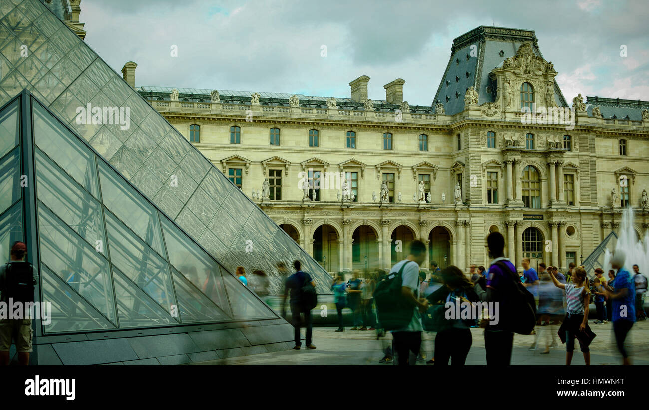 Louvre and the Pyramid.The Louvre is the most visited art museum in the world and a historic monument. Stock Photo