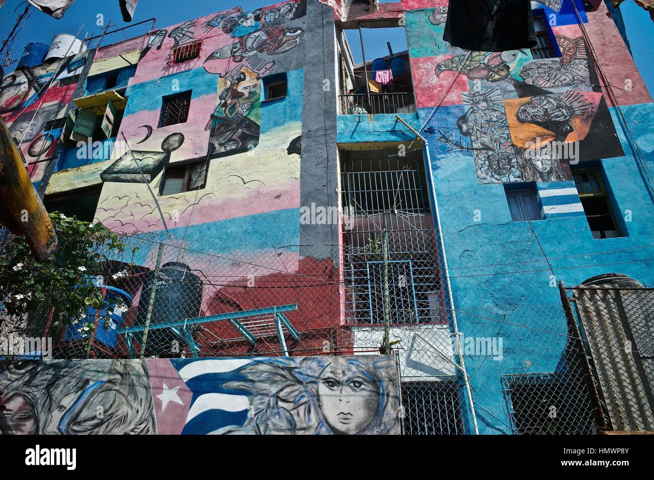 Callejón de Hammel in Vedado, famous for its exotic and colorful murals by painter Salvador Gonzalez, is an open-air Afro-Cuban Sanctuary. Stock Photo