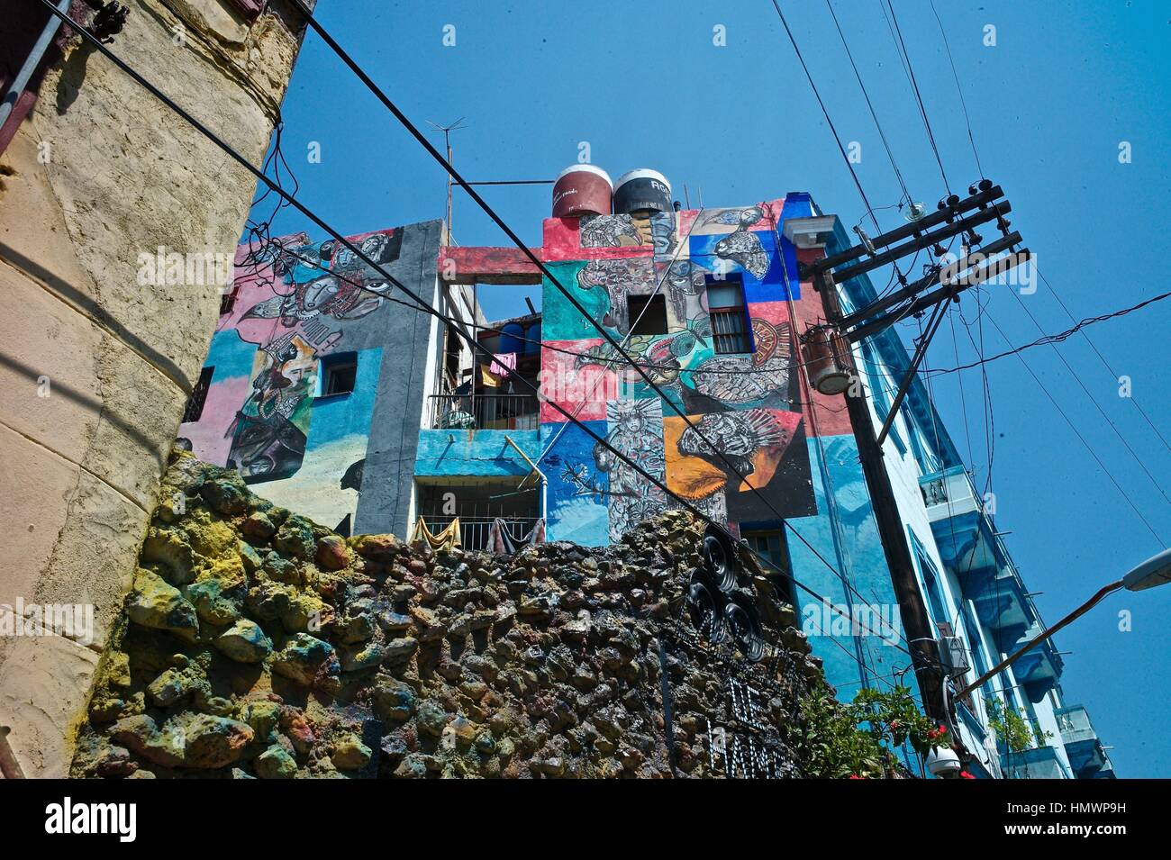 Callejón de Hammel in Vedado, famous for its exotic and colorful murals by painter Salvador Gonzalez, is an open-air Afro-Cuban Sanctuary. Stock Photo