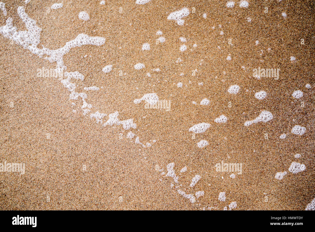 Sand Rushing water waves rushing in sand Stock Photo - Alamy