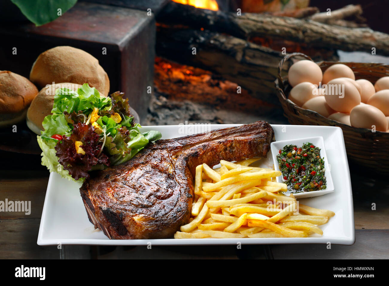 Prime rib with fries and salad Stock Photo - Alamy