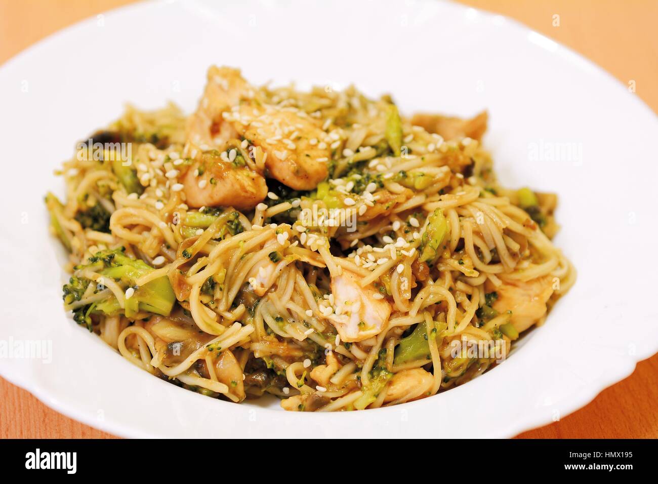 Chinese noodles with chicken meat, broccoli and vegetables Stock Photo Alamy