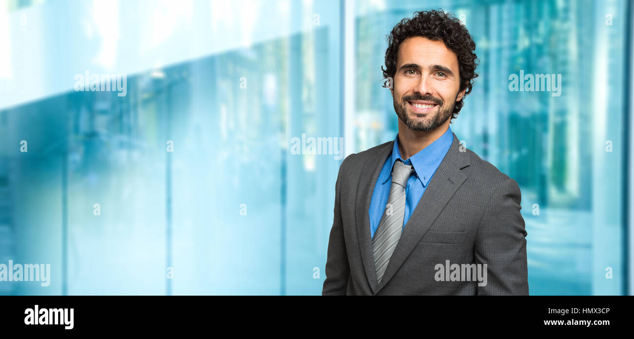 Portrait of an handsome businessman Stock Photo - Alamy