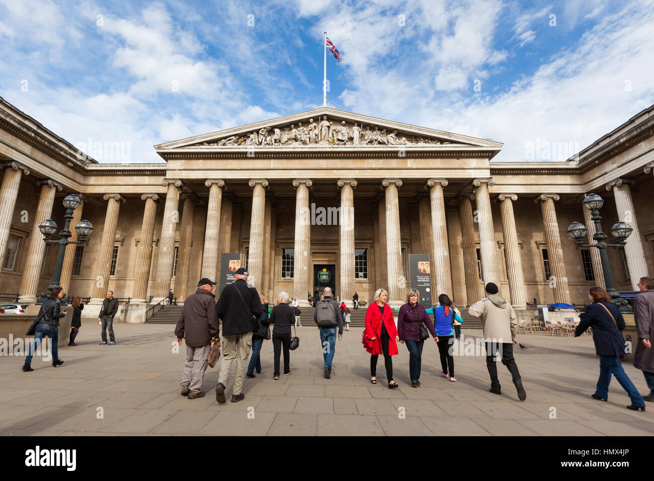 LONDON - SEPT 19 : People outside the British Museum in London on 19th Sept 2013. Taken during the acclaimed Pompeii exhibition which ran for 6 months Stock Photo