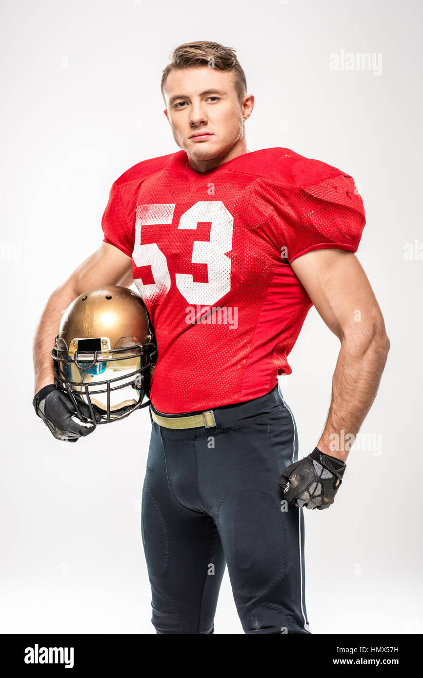 football player holding helmet icon Football player holding helmet Stock Photo