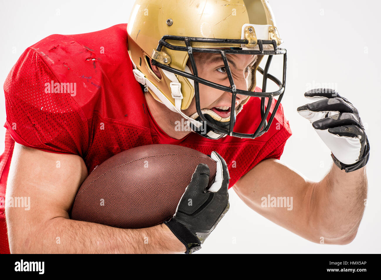 Football player running with ball Stock Photo Alamy