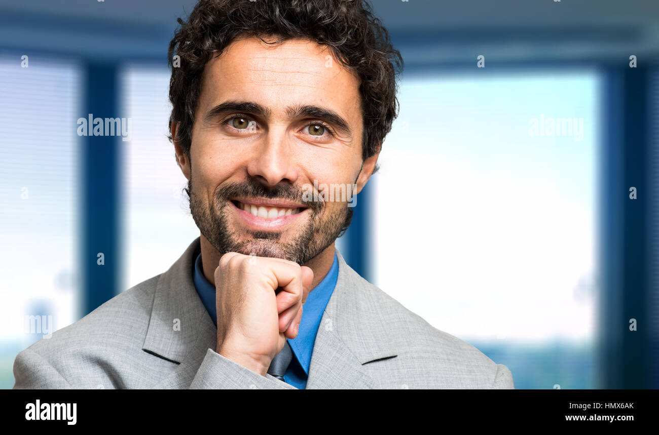 Portrait of an handsome businessman Stock Photo - Alamy