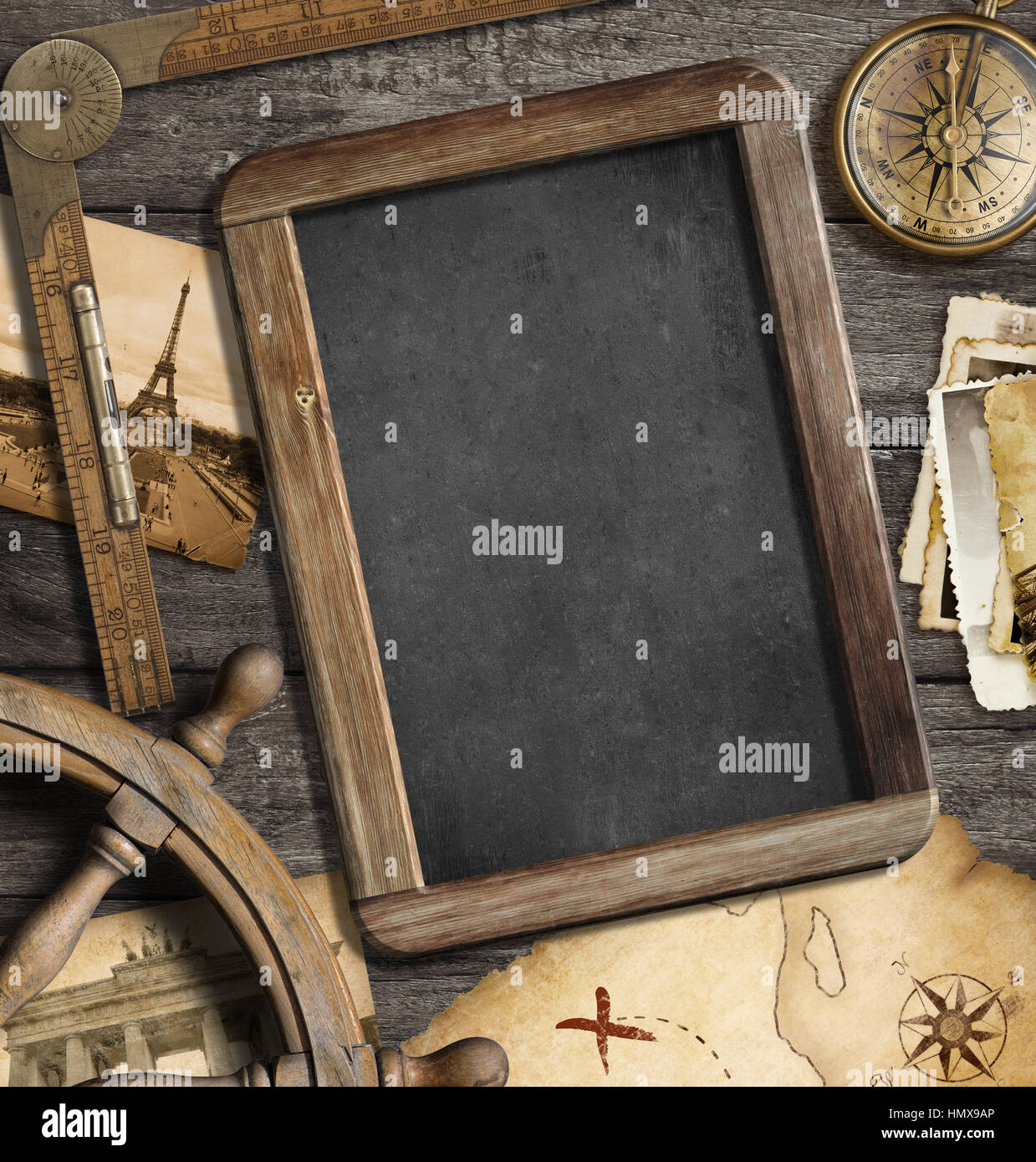 Vintage treasure map, blackboard with copyspace, old compass still life. Adventure or discovery concept. Stock Photo