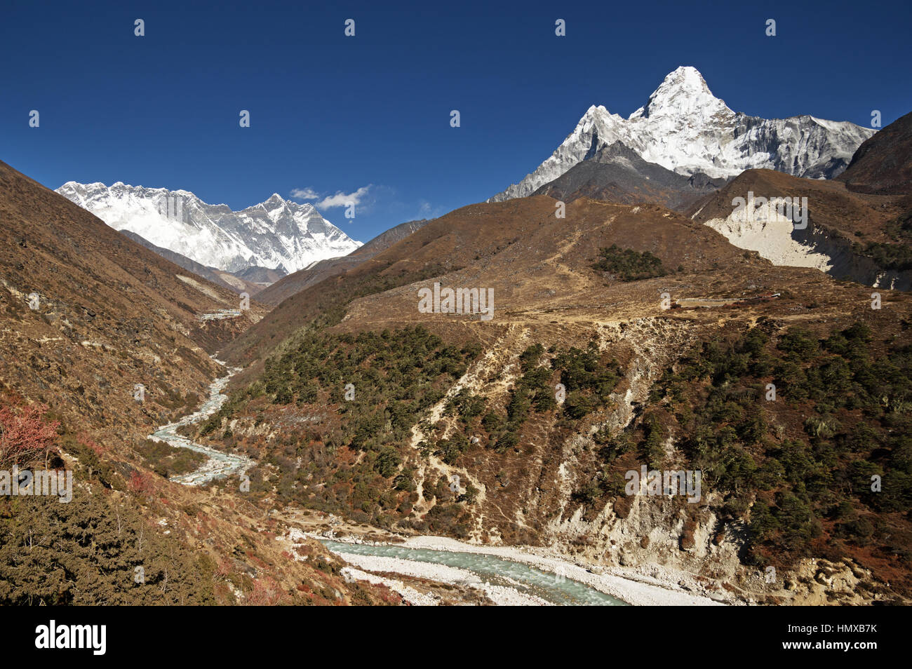Himalayan Valley of the Imja Khola River with views towards Shomare Nuptse Lhotse and Ama Dablam Stock Photo